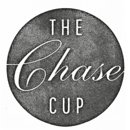 The Chase Cup logo in white lettering, with Chase in script, on a textured dark grey circle.