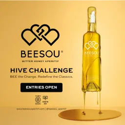 Beesou bottle dripping honey on a golden background beside text: Beesou Hive Challenge, BEE the Change, Redefine the Classics, entries open.