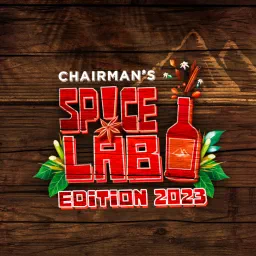 Chairman's Spice Lab Edition 2023 logo in red on wood, with a red bottle, star anise, cinnamon and leaves.
